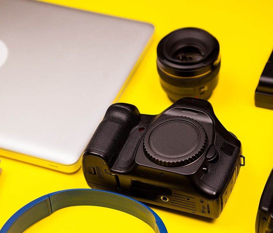 electronic goods on yellow background